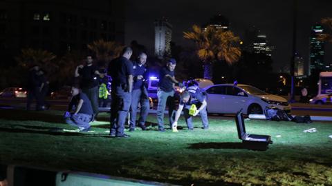 Israeli security forces inspect the scene of the Jaffa attack that claimed the life of Taylor Force, March 08, 2016 (Daniel Bar On/Anadolu Agency/Getty Images)