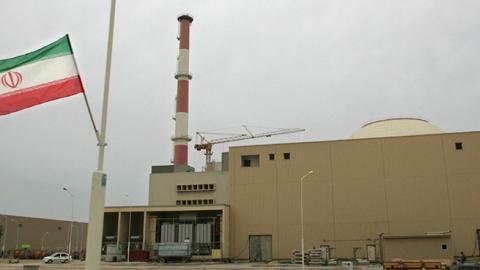 An Iranian flag is seen outside the Bushehr nuclear power plant (BEHROUZ MEHRI/AFP/Getty Images)