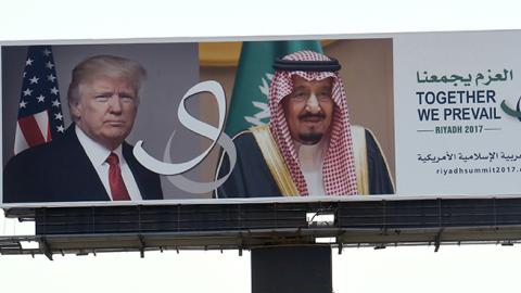 A giant billboard bearing portraits of US President Donald Trump and Saudi Arabia's King Salman, Riyadh, May 19, 2017 (FAYEZ NURELDINE/AFP/Getty Images)
