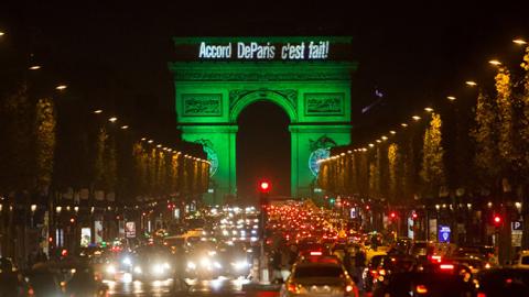 The Arc de Triomphe in Paris, France, is illuminated in green to celebrate the entry into force of the Paris Agreement, November 4, 2016 (U.S. Department of State)