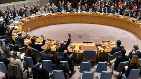 Fourteen members of the Security Council raise their hands in affirmation of Resolution 2334, December 23, 2016 (Albin Lohr-Jones/Pacific Press/LightRocket via Getty Images)