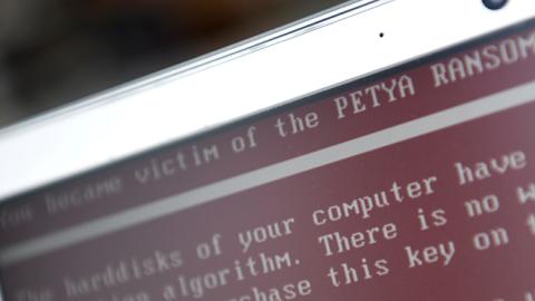 A message demanding money on a computer infected by the Petya ransomare in Yaketerinburg, Russia, June 28, 2017 (Donat Sorokin\TASS via Getty Images)
