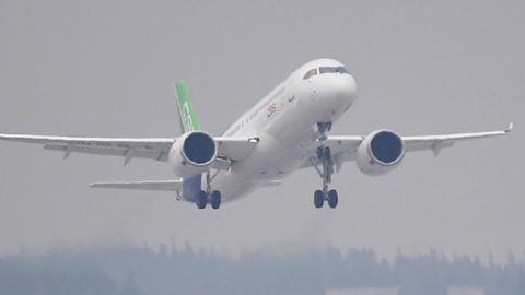 China's home-grown C919 passenger jet takes off on its maiden flight in Shanghai, May 5, 2017 (GREG BAKER/AFP/Getty Images)
