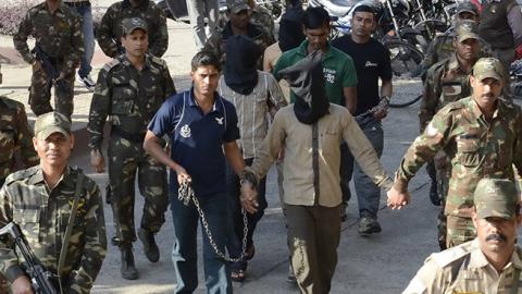 SIMI operatives led to court in Bhopal, India, May 13, 2014 (Praveen Bajpai/Hindustan Times via Getty Images)