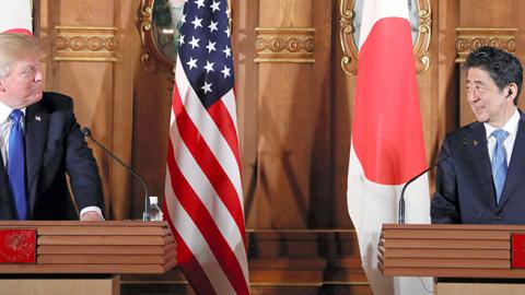 President Donald Trump and Japanese Prime Minister Shinzo Abe attend a joint press conference in Tokyo, November 6, 2017 (The Asahi Shimbun via Getty Images)