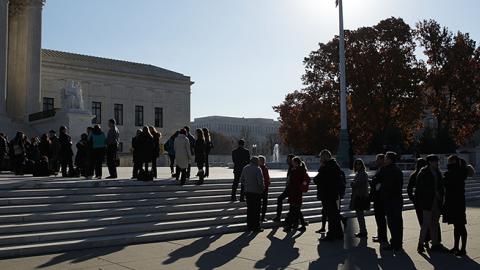 People wait in line to enter the U.S. Supreme Court to view a hearing on Carpenter v. United States, November 29, 2017 (Alex Wong/Getty Images)