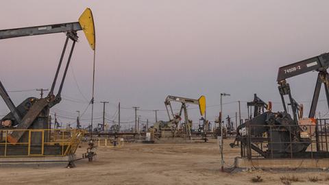 Pump jacks at the Belridge Oil Field and hydraulic fracking site in California, November 4, 2014 (Citizens of the Planet/Education Images/UIG via Getty Images)