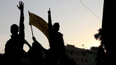 Iranians protest in Tehran, December 30, 2017 (Stringer/Anadolu Agency/Getty Images)