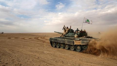 Tank flying the flag of Asa'ib Ahl al-Haq, November 25, 2017 (AHMAD AL-RUBAYE/AFP/Getty Images)