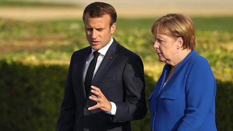 Emmanuel Macron and Angela Merkel during the 2018 NATO Summit, July 11, 2018 (Sean Gallup/Getty Images)