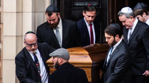 The caskets of brothers David Rosenthal and Cecil Rosenthal who were killed at the mass shooting at the Tree of Life Synagogue are carried out of the Rodef Shalom Synagogue on Tuesday, October 30, 2018, in Pittsburgh, PA. (Photo by Salwan Georges/The Wash