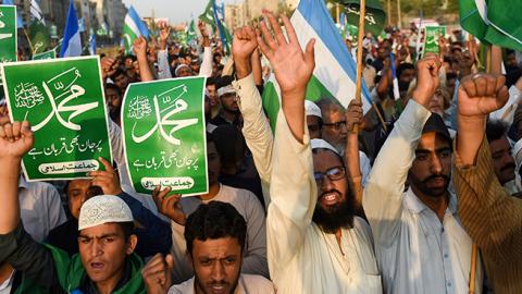 Pakistani supporters of Jamaat-e-Islami, a religious political party, chant slogans and gestures following the Supreme Court decision to acquit Christian woman Asia Bibi of blasphemy, in Karachi on November 4, 2018 (RIZWAN TABASSUM/AFP/Getty Images)