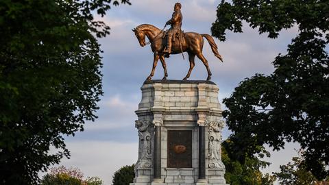 A statue of Confederate General Robert E. Lee along Monument Avenue in Richmond, VA. (Photo by Salwan Georges/The Washington Post via Getty Images)