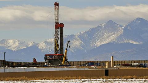 A large fracking operation becomes a new part of the horizon with Mount Meeker and Longs Peak looming in the background on December 28, 2017 in Loveland, Colorado.  (Photo by Helen H. Richardson/The Denver Post via Getty Images)