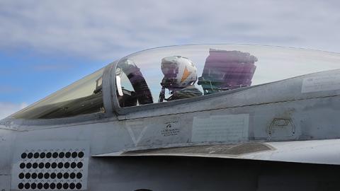 An F/A-18 Hornet pilot prepares for take off during joint military exercise, Saxon Warrior, aboard the USS George H.W. Bush on August 6, 2017 off the north west coast of the United Kingdom. (Photo by Dan Kitwood/Getty Images)