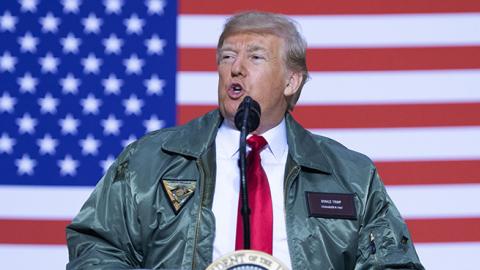 President Donald Trump speaks to members of the US military during an unannounced trip to Al Asad Air Base in Iraq, December 26, 2018. (SAUL LOEB/AFP/Getty Images)