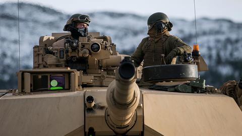 U.S. Marines drive an M1 Abrams to take part in an exercise to capture an airfield as part of the Trident Juncture 2018, a NATO-led military exercise, on November 1, 2018 near the town of Oppdal, Norway. (JONATHAN NACKSTRAND/AFP/Getty Images)