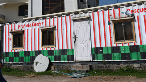 A Pakistani man walks past closed offices of the Falah-e-Insaniat Foundation -- an organisation believed by the UN to be a front for the banned Islamist militant group Lashkar-e-Taiba -- in Islamabad on March 6, 2019. (AAMIR QURESHI/AFP/Getty Images)