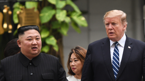 US President Donald Trump (R) walks with North Korea's leader Kim Jong Un during a break in talks at the second US-North Korea summit in Hanoi on February 28, 2019. (SAUL LOEB/AFP/Getty Images)