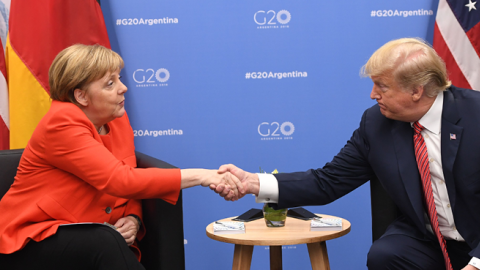 Germanys Chancellor Angela Merkel (L) and US President Donald Trump shake hands during a bilateral meeting, on the sidelines of the G20 Leaders' Summit in Buenos Aires, on December 01, 2018. (SAUL LOEB/AFP/Getty Images)