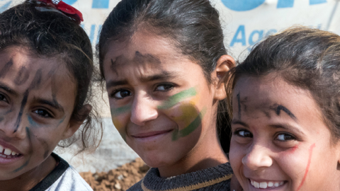 Girls in front of a UNHCR refugee tent in the Hasan Sham refugee camp. The tent camp near the largely destroyed former IS stronghold of Mossul accommodates 3,300 of the 1.8 million internally displaced persons in Iraq. (picture alliance via Getty Images)