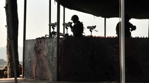  Indian army soldiers take position near the Line of Control on October 10, 2016 in Nowshera sector, about 145 km from Jammu, India. (Hindustan Times via Getty Images)