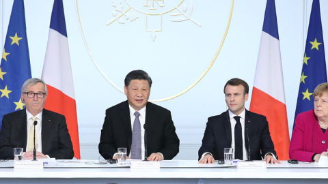 Chinese President Xi Jinping, French President Macron, and German Chancellor Merkel attend the closing ceremony of a global governance forum in Paris, France, March 26, 2019. (Getty Images)