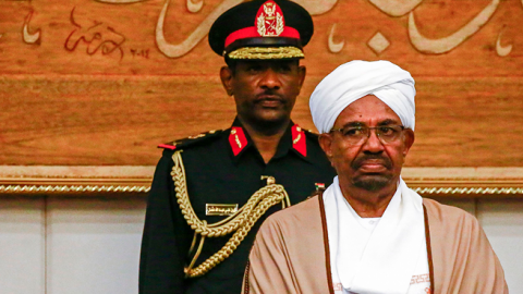 Sudan's President Omar al-Bashir attends a meeting with his new 20-member cabinet as they take oath at the presidential palace in the capital on March 14, 2019. (ASHRAF SHAZLY/AFP/Getty Images)