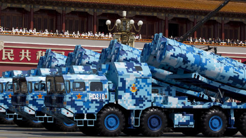 Military vehicles carry DF-10 ship launched cruise missiles, drive past the Tiananmen Gate on September 3, 2015 in Beijing, China. (Andy Wong - Pool /Getty Images)