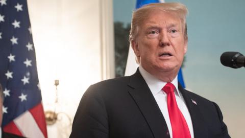 US President Donald Trump speaks alongside US Secretary of State Mike Pompeo prior to signing a Proclamation on the Golan Heights in DC, March 25, 2019. (SAUL LOEB/Getty Images)