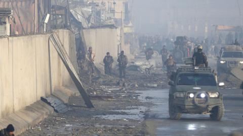 Afghan security forces gather at the site of a powerful truck bomb attack (claimed by the Taliban) a day after it detonated near a foreign compound in Kabul on January 15, 2019. (WAKIL KOHSAR/AGetty Images)