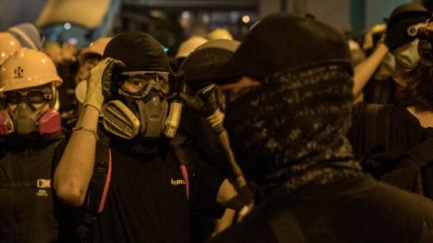 Protesters clash with police after taking part in an anti-extradition bill march on July 21, 2019 in Hong Kong, China. (Chris McGrath/Getty Images)