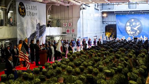 Japan's Prime Minister Shinzo Abe delivers a speech to Japanese and U.S. troops with U.S. President Donald Trump, May 28, 2019. (Athit Perawongmetha - Pool/Getty Images) 