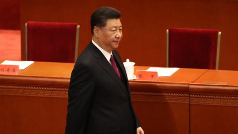 Chinese President Xi Jinping enters the Great Hall of the People to deliver a speech. (Andrea Verdelli/Getty Images)