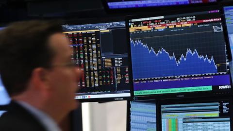 Traders work on the floor of the New York Stock Exchange as Wall Street continues to worry about future inflation and rising interest rates. (Spencer Platt/Getty Images)