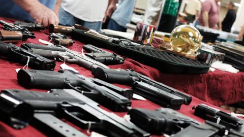 Guns stand for sale at a gun show on November 24, 2018 in Naples, Florida. (Spencer Platt/Getty Images)