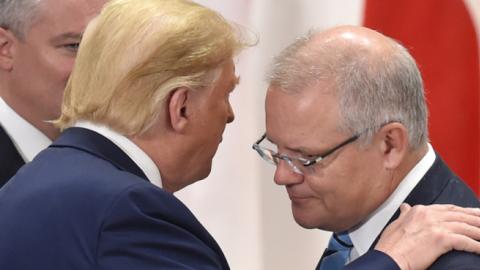 Australia's Prime Minister Scott Morrison chats with US President Donald Trump at the G20 Summit on June 29, 2019 in Osaka, Japan. (Pool/Getty Images)