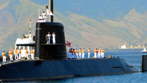 The Maritime Self-Defense Force submarine Oyashio, foreground, and two destroyers anchor at Subic Bay on April 3, 2016 in Subic, Philippines. (The Asahi Shimbun via Getty Images)