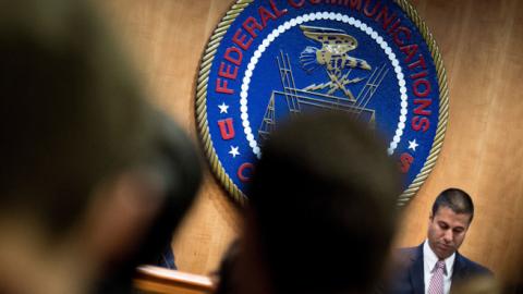 FCC Chairman Ajit Pai listens during a hearing at the Federal Communications Commission on December 14, 2017 in Washington, DC (BRENDAN SMIALOWSKI/AFP/Getty Images)
