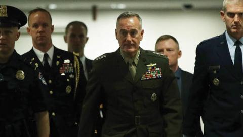  Chairman of Joint Chiefs of Staff General Joseph Dunford (C) arrives at a closed briefing for Senate members May 21, 2019 on Capitol Hill in Washington, DC.