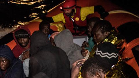 Refugees and migrants are transferred to the Spanish Proaciva Open Arms NGO rescue vessel Golfo Azzurro after being rescued by the Italian Coast Guard at 24 miles (46 km) north of Sabratha, Lybia on February 17, 2017 at Sea