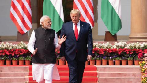 President Donald J. Trump and Indian Prime Minister Narendra Modi walk together from Hyderabad House to deliver a joint press statement Tuesday, Feb. 25, 2020, on the lawn of Hyderabad House in New Delhi