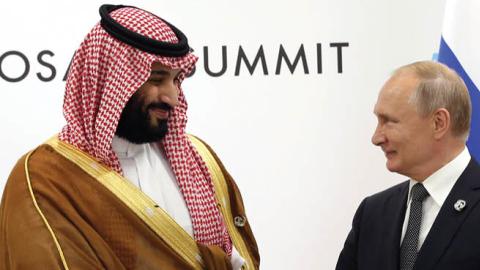 Russian President Vladimir Putin (R) and Saudi Arabia's Prince and Defence Minister Mohammad bin Salman al Saud (L) attend their bilateral talks at the G20 Osaka Summit 2019,  on June 29, 2019 in Osaka, Japan. Vladimir Putin has arrived to Japan to partci