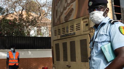 A police man wearing a face mask in Dakar, Senegal, on March 3, 2020. (Jerome Gilles/NurPhoto via Getty Images)