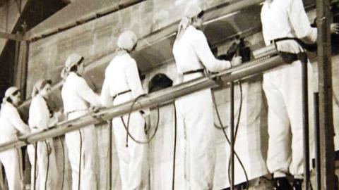 Women factory workers assemble wings during World War II