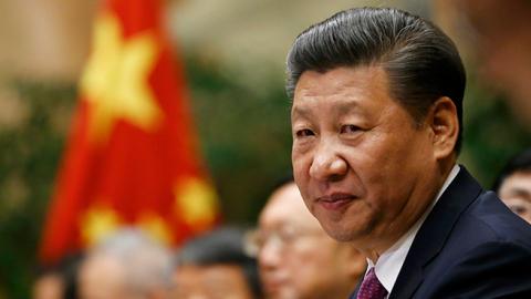 Chinese President Xi Jinping looks on during a meeting at the United Nations European headquarters in Geneva, on January 18, 2017. (DENIS BALIBOUSE/AFP via Getty Images)