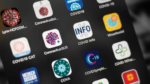A selection of mobile apps relating to the COVID-19 coronavirus pandemic are seen on a tablet screen on March 26, 2020 in London, England. The Coronavirus (COVID-19) pandemic has spread to many countries across the world, claiming over 20,000 lives and in