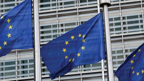 European Union flags hang outside the European Commission Headquarters on March 10, 2017 in Brussels, Belgium