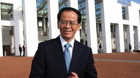 Chinese Ambassador to Australia Cheng Jingye poses during a photo shoot outside Parliament House in Canberra, Australian Capital Territory