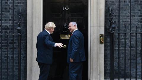Israel's Prime Minister Benjamin Netanyahu is greeted by Prime Minister Boris Johnson at 10 Downing Street on September 5, 2019 in London, England.